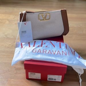 VALENTINO GARAVANI
clutches V Logo canvas and leather